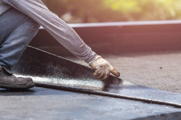 Professional Emergency Waterproofing technician working in Russellville, AL